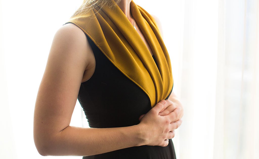 lifestyle visible^^A person using the Shepherd's Wool Utility Cloth as a shawl.