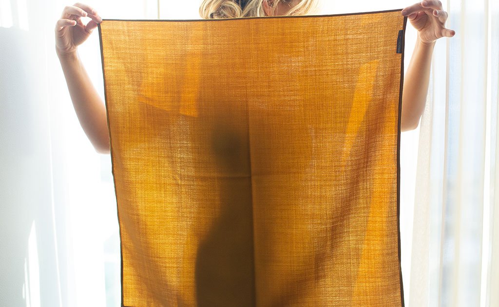lifestyle visible^^A person holding the Shepherd's Wool Utility Cloth.